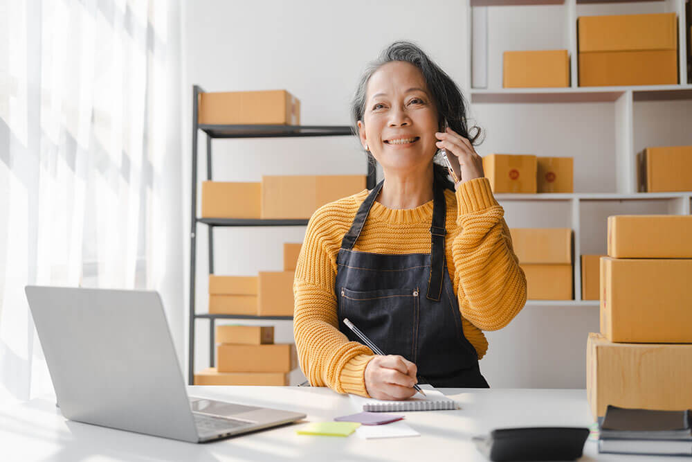 Mature asian business owner