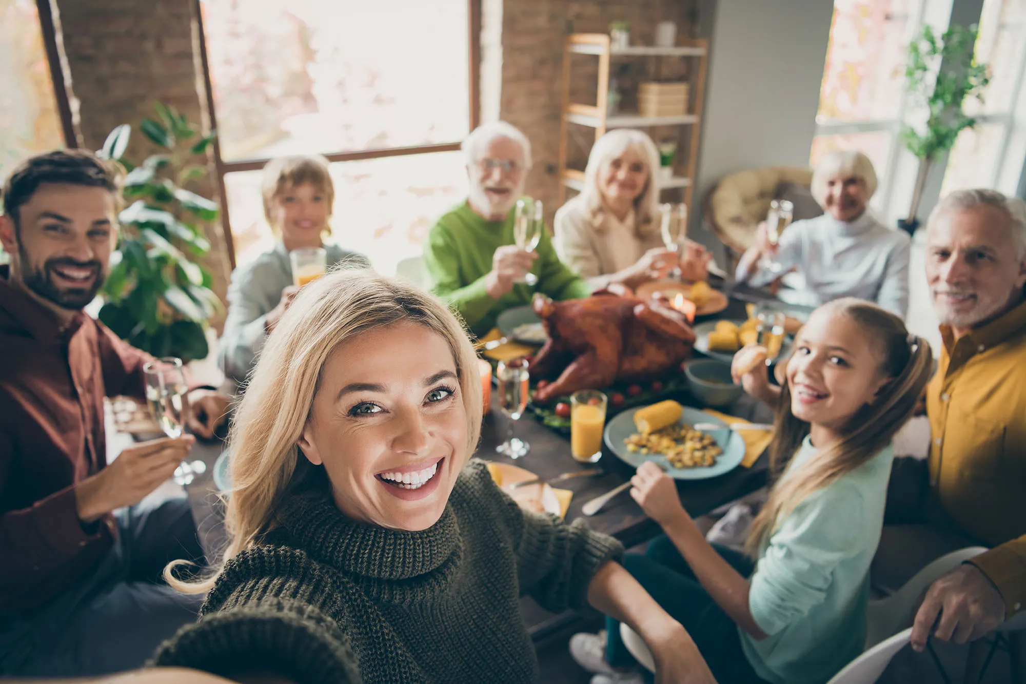 Big family gathering eating festal meal